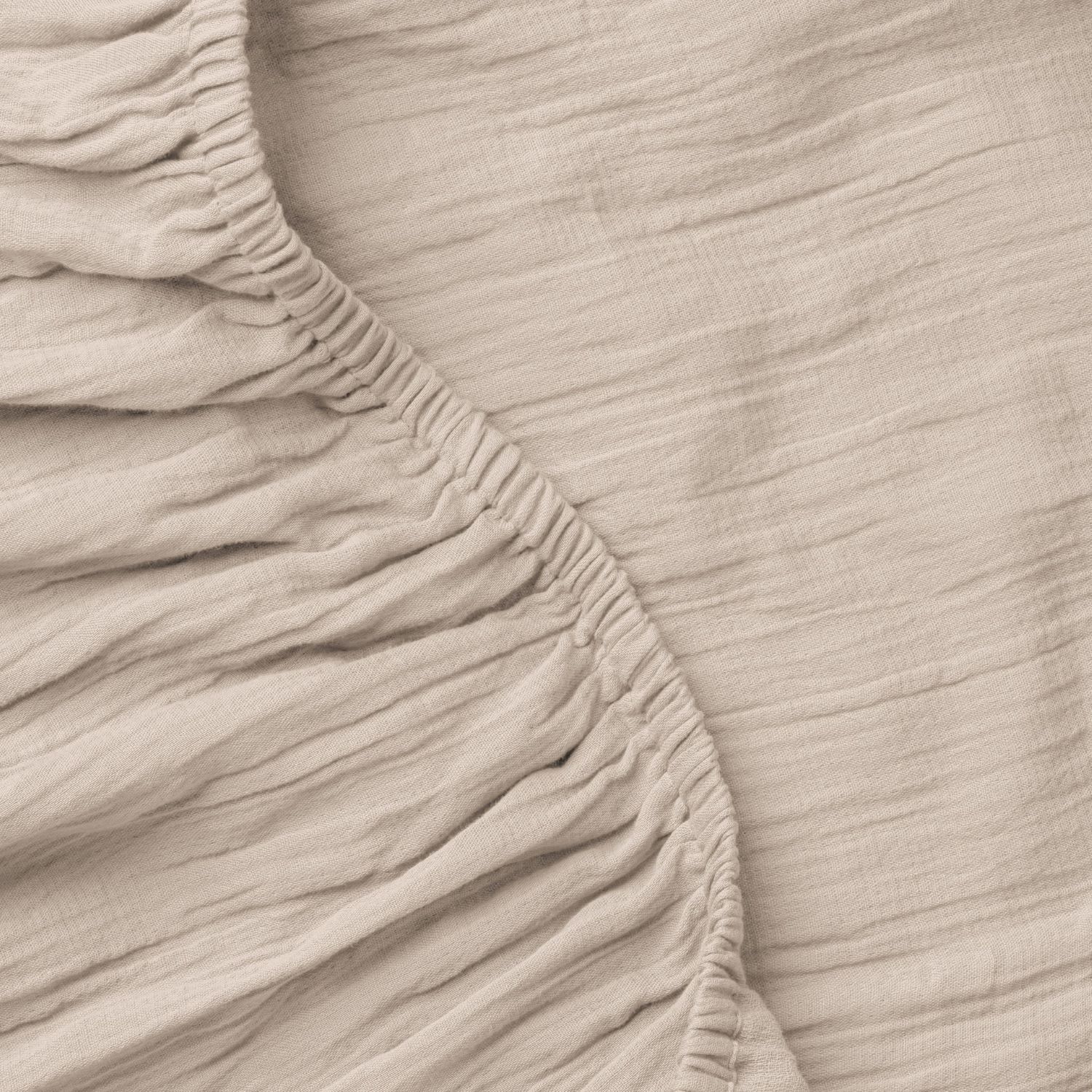 Light beige sheet with gathered texture and stitched detailing