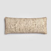 Decorative lumbar pillow with intricate woven beige and gray pattern