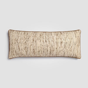 Decorative lumbar pillow with intricate woven beige and gray pattern