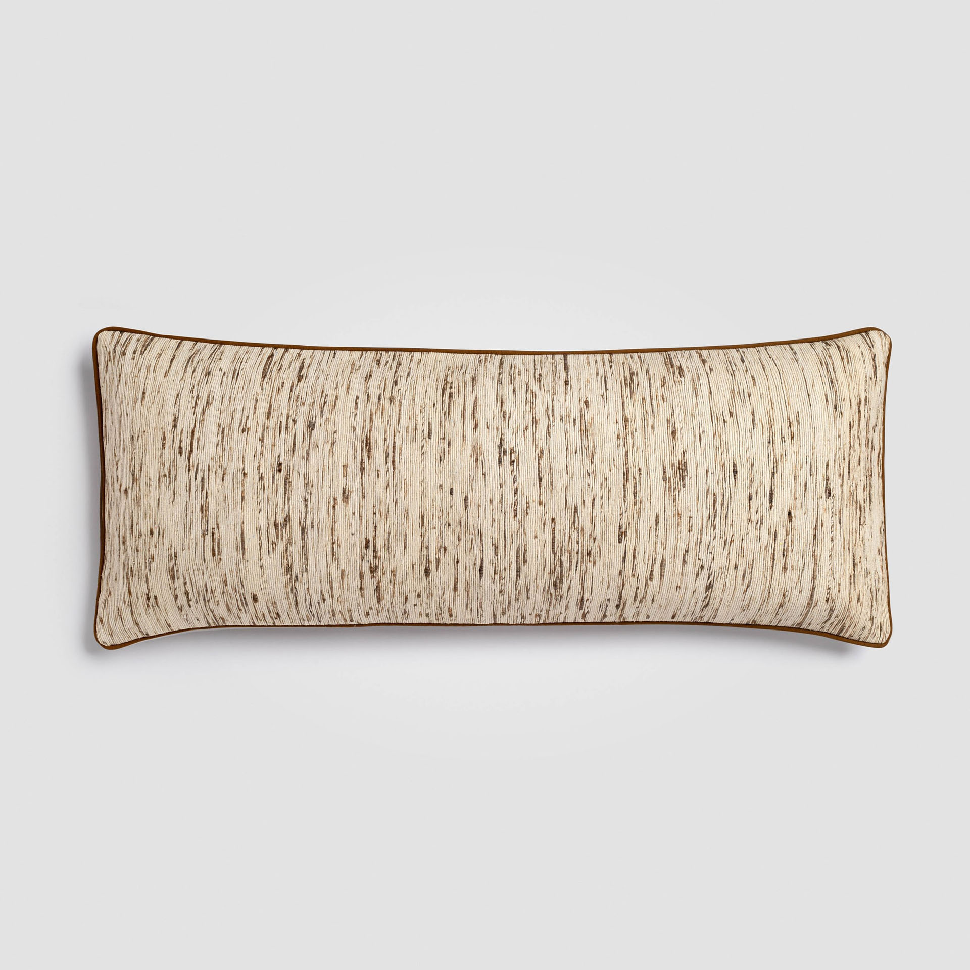Decorative lumbar pillow with intricate woven beige and gray pattern