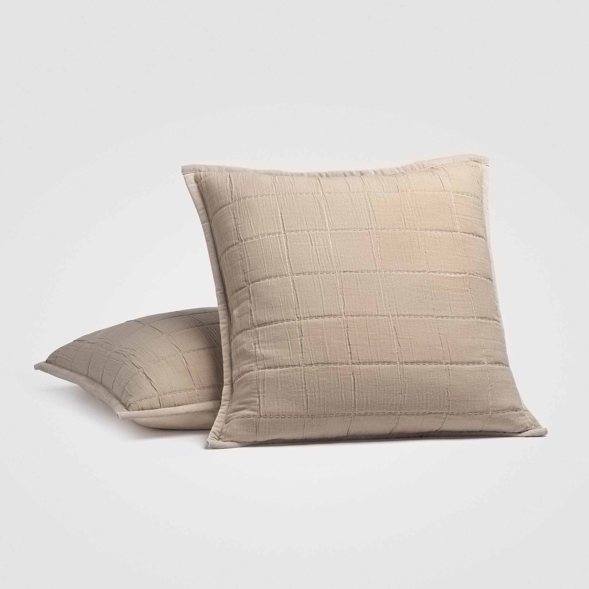 Crane home bedding posed on a white background