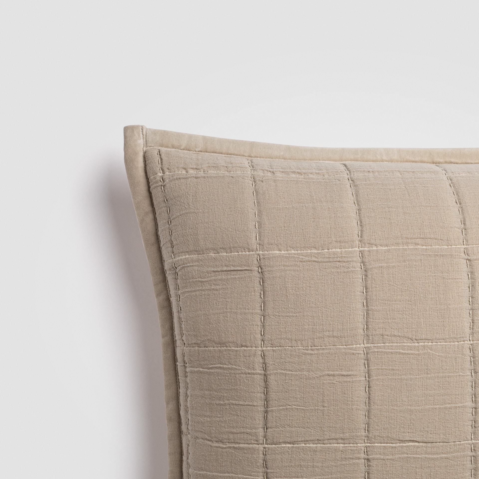 Crane home bedding posed on a white background