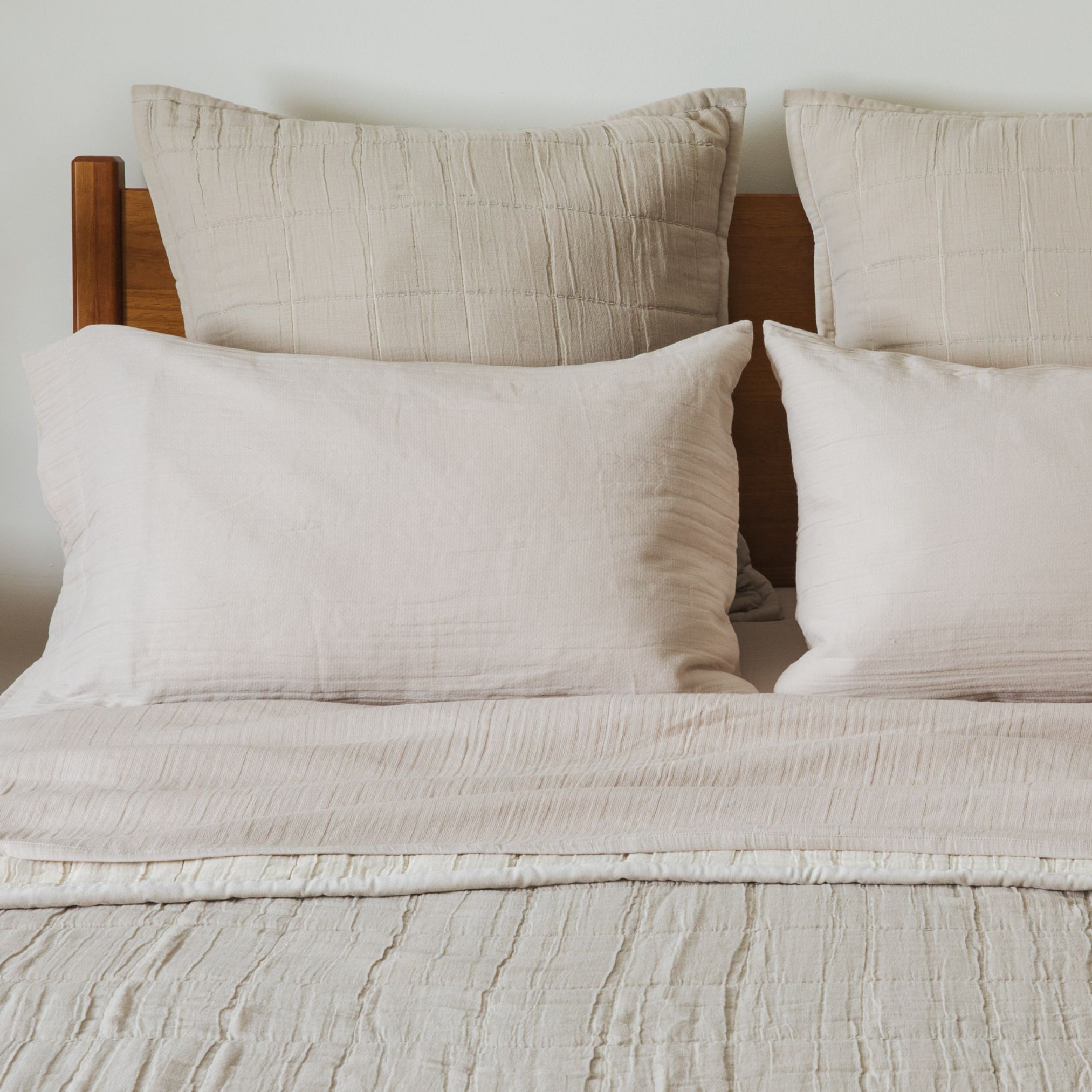 Crane home bedding posed in a real bedroom