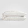Crane home bedding posed on a white background