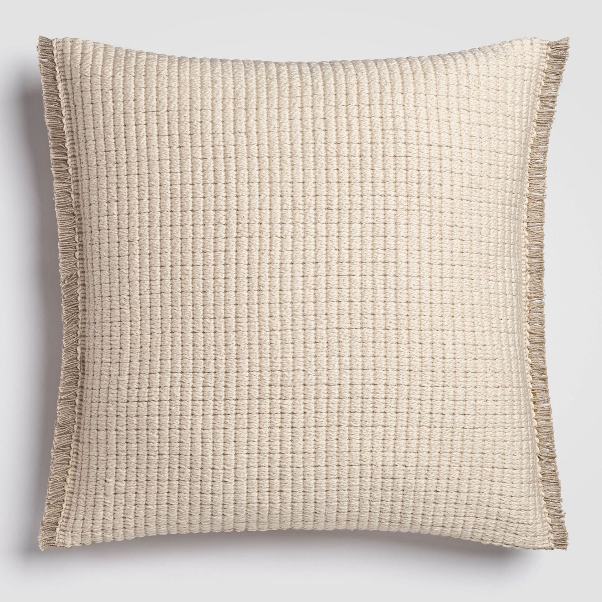 Light beige pillow with subtle woven texture and clean edges