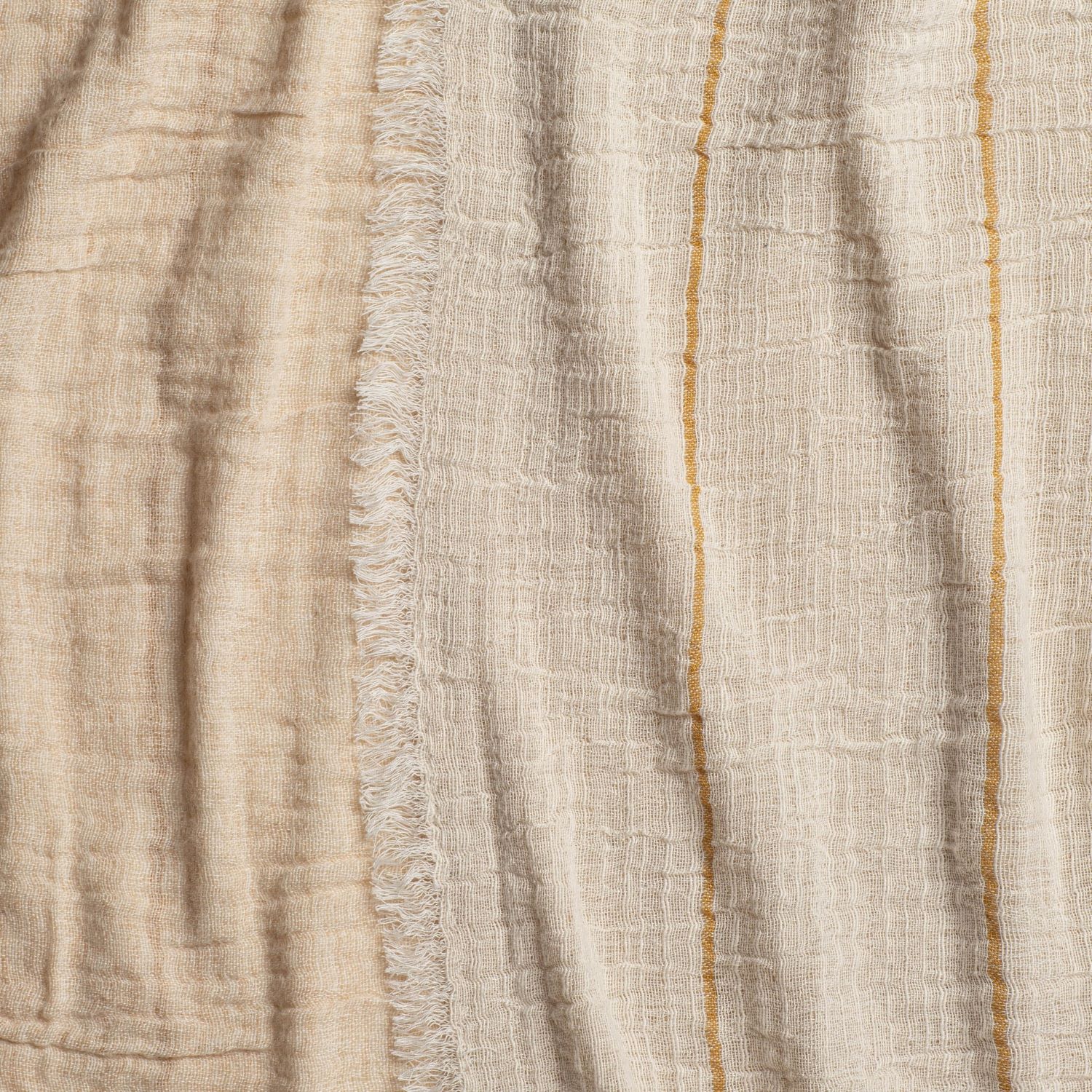 Close-up of throw blanket beige