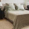 Cozy scene of a bedroom with crane home products