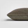 Rectangular pillow with thick woven texture in beige and black tones