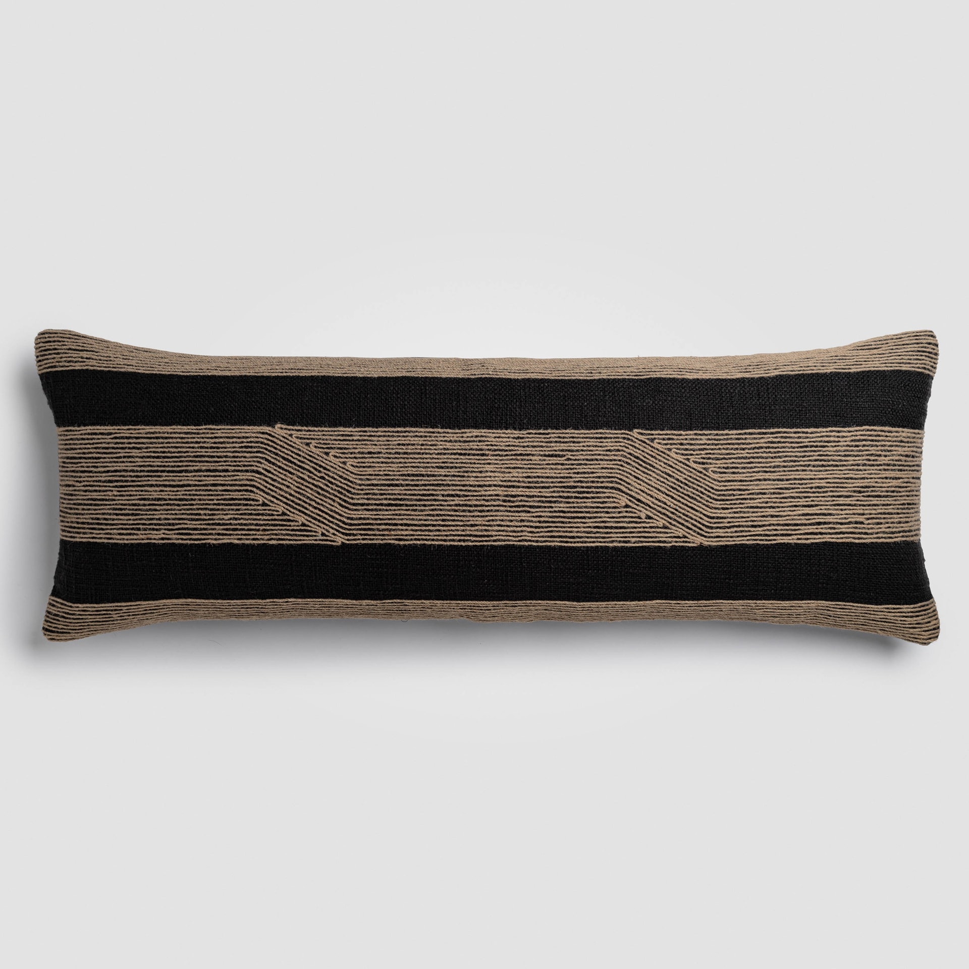 Side view of a rectangular pillow with horizontal black and beige stitched detailing
