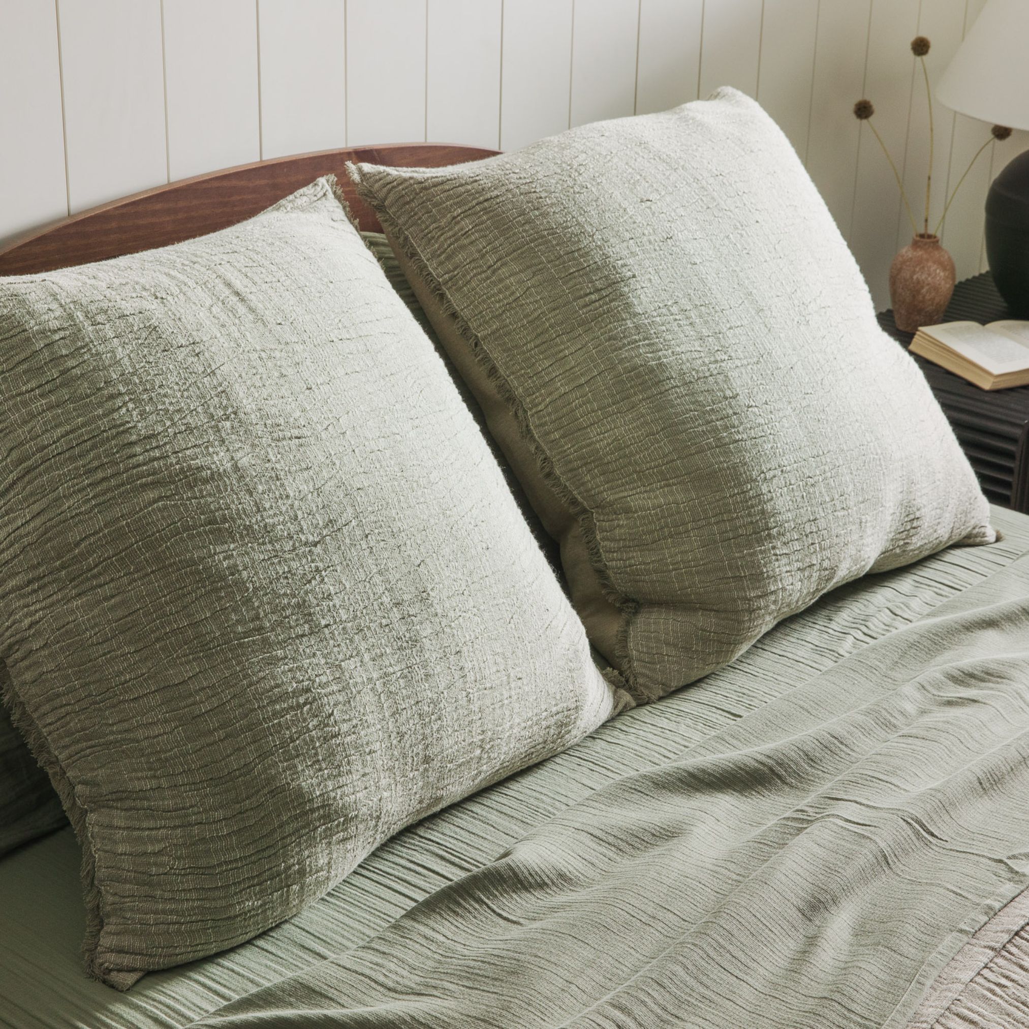 Crane home bedding posed in a real bedroom