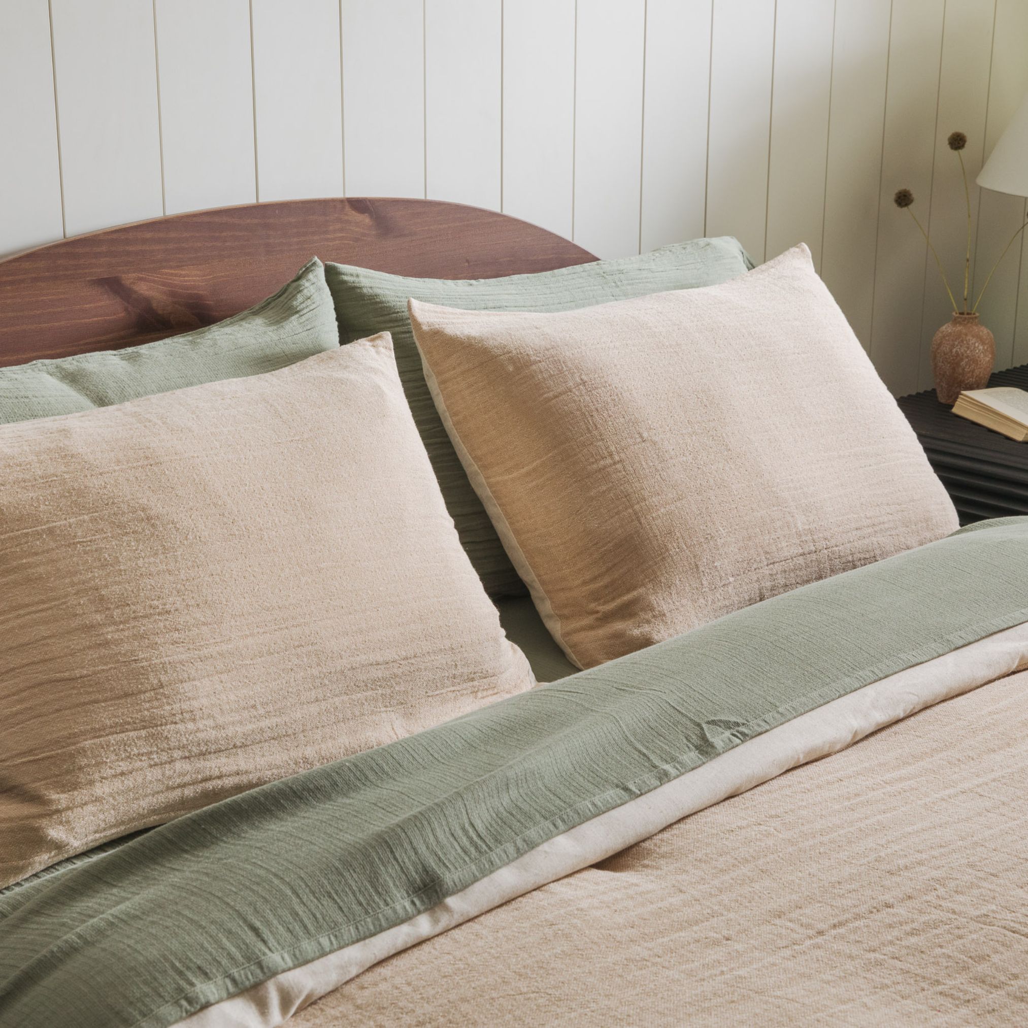 Cozy scene of a bedroom with crane home products