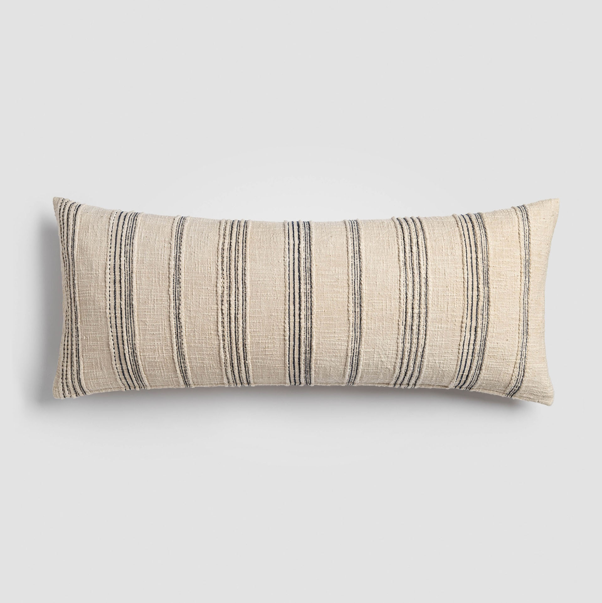 White striped decorative pillow with subtle texture