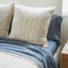 Crane home bedding posed in a real bedroom