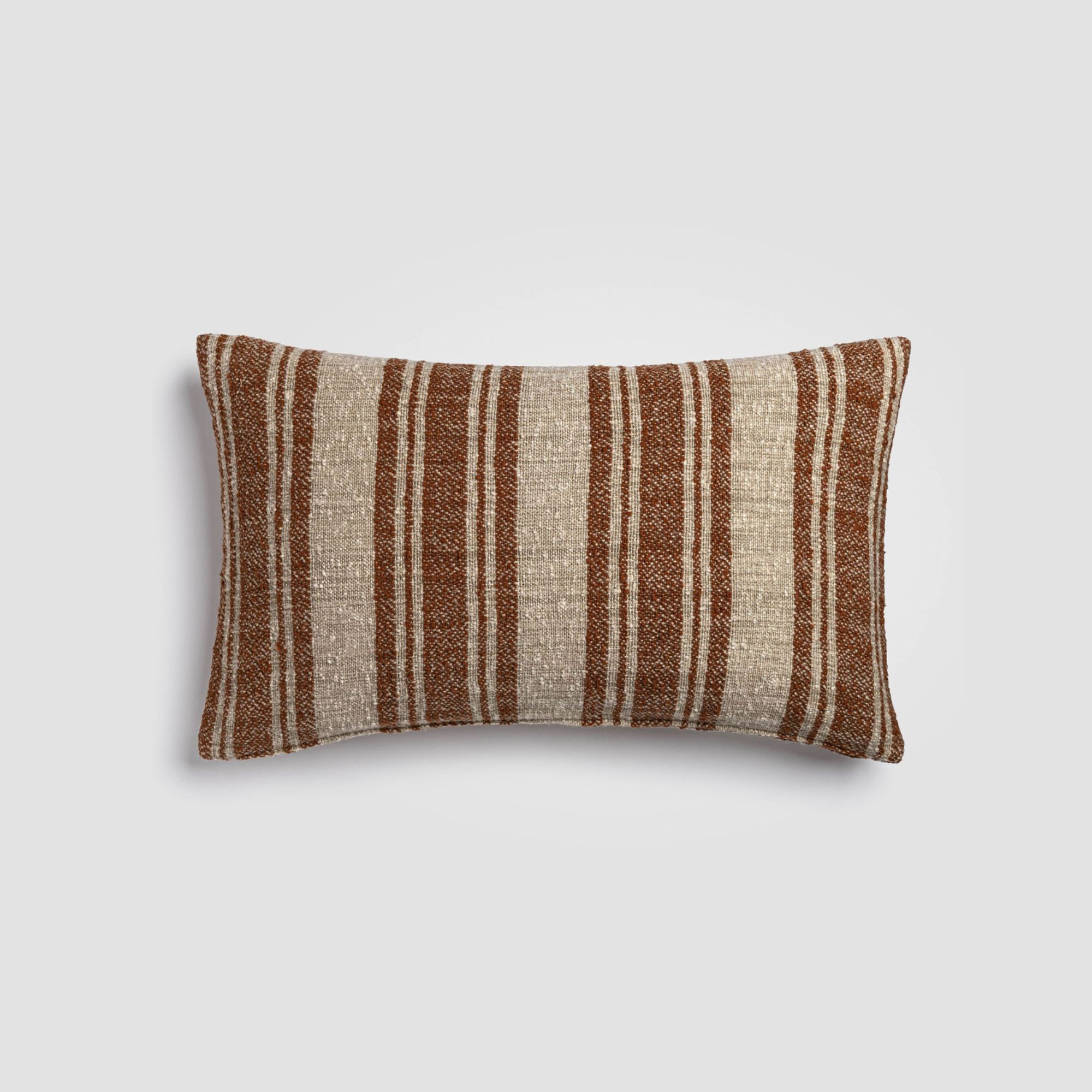 CH-210DP-5_(1)_HERO Brown and white striped decorative pillow with subtle texture
