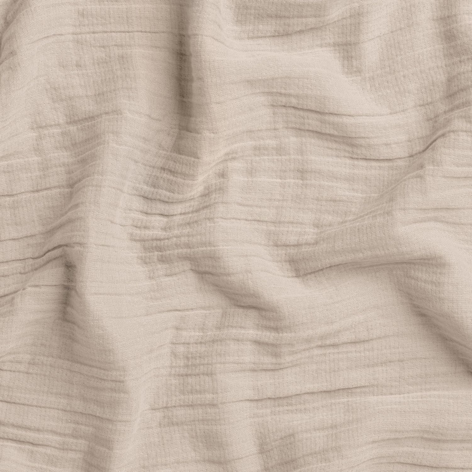 Close-up of beige woven fabric with visible texture