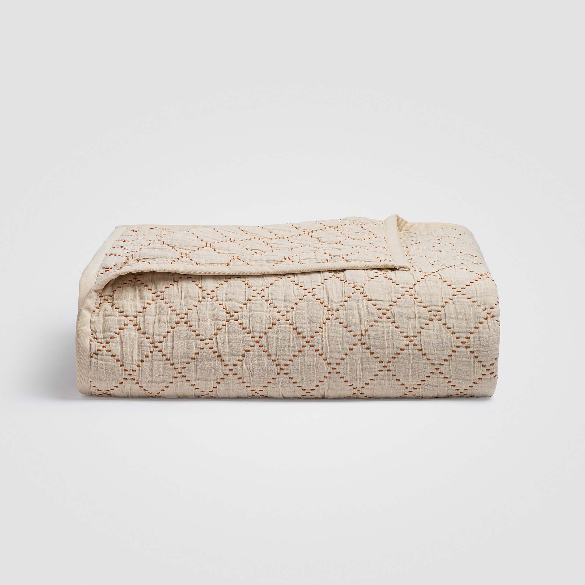 Crane home bedding posed on a white background