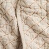 Close up shot of crane home bedding