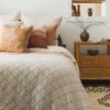 Cozy scene of a bedroom with crane home products