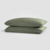 two green pillows stacked on eachother