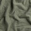 Close up of crane home bedding fabric to show detail
