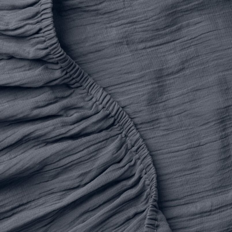 Close up of crane home bedding fabric to show detail