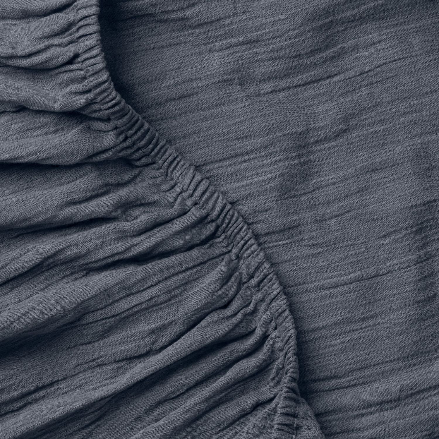 Close up of crane home bedding fabric to show detail