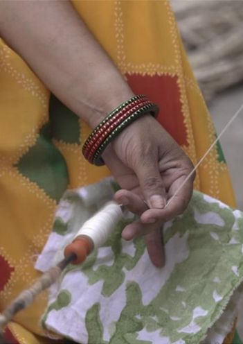 Close up of a worker hand crafting an item