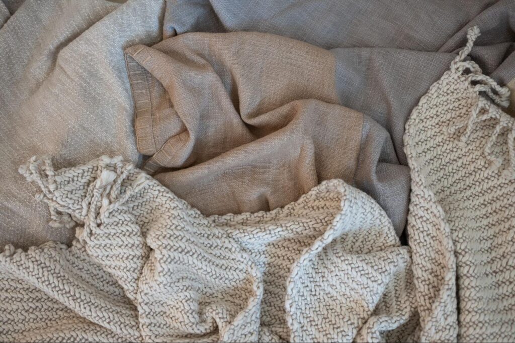 Layer of different textured throws
